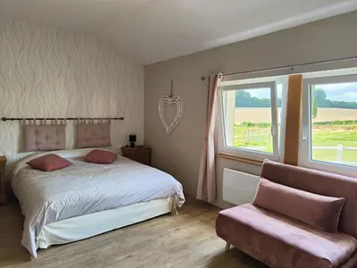 Un ou plusieurs lits dans un hébergement de l'établissement Gîte équestre. Ferme des Essarts