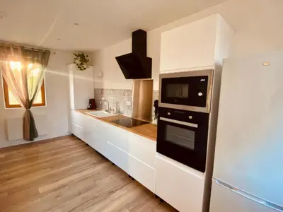 Cuisine ou kitchenette dans l'établissement Aux 3 Noyers