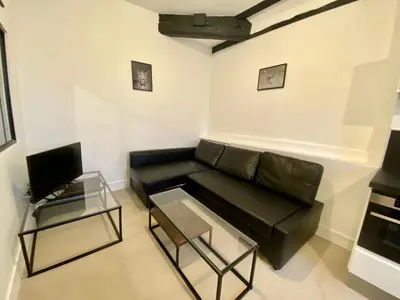 Coin salon dans l'établissement Henry I - petit appartement lumineux - 014