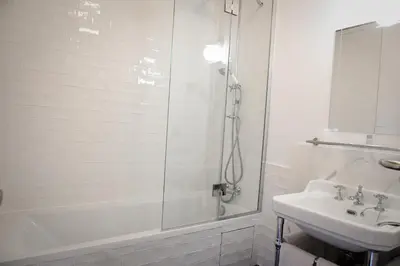 Salle de bains dans l'établissement Auberge la Renaissance