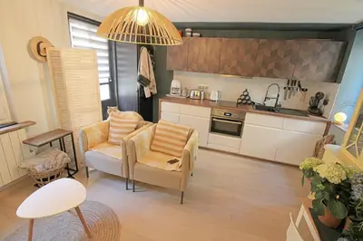Cuisine ou kitchenette dans l'établissement le cocon de la Bouille