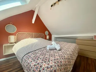 Un ou plusieurs lits dans un hébergement de l'établissement Magnifique duplex pour huit personnes -070