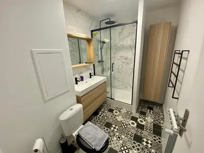 Salle de bains dans l'établissement Le cœur de Rive gauche - Superbe T3 - parking - 082