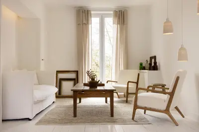 Coin salon dans l'établissement Ô PLUM'ART Chambres de caractère