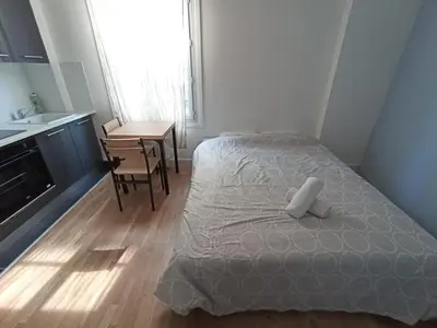 Un ou plusieurs lits dans un hébergement de l'établissement Studio cosy - Hypercentre - 20 min to Paris