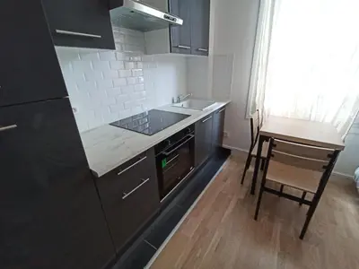 Cuisine ou kitchenette dans l'établissement Studio cosy - Hypercentre - 20 min to Paris