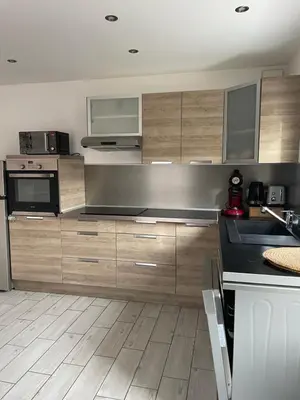Cuisine ou kitchenette dans l'établissement Agréable maison 3* en bord de mer