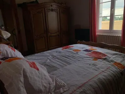 Un ou plusieurs lits dans un hébergement de l'établissement chambre chez l'habitant 2