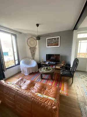 Coin salon dans l'établissement Home Sweet Home