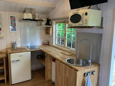 Cuisine ou kitchenette dans l'établissement Chalet cosy bord de Seine 30min paris