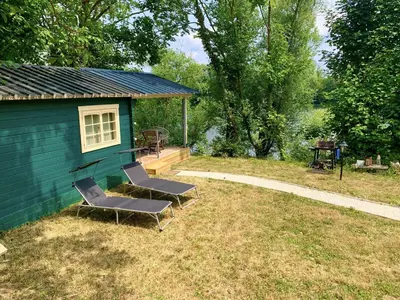 Jardin de l'établissement Chalet cosy bord de Seine 30min paris