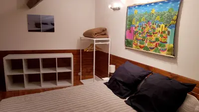 Un ou plusieurs lits dans un hébergement de l'établissement Loft en duplex avec vue sur plage et chenal
