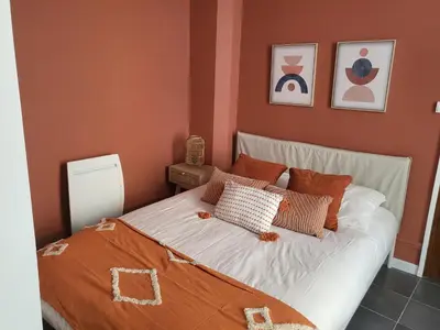 Un ou plusieurs lits dans un hébergement de l'établissement Appart' Terracotta - Champs Élysées 20 mn - NETFLIX