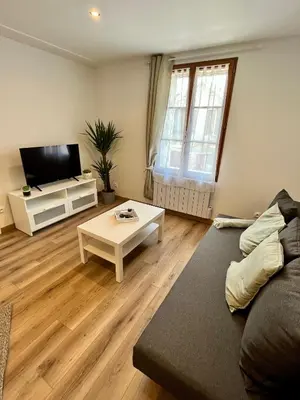 Télévision ou salle de divertissement dans l'établissement La Pause Cosy