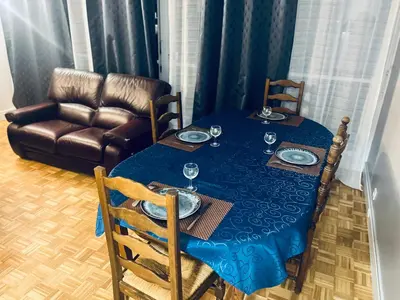 Coin salon dans l'établissement Spacieux et confortable appartement en résidence