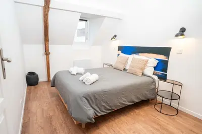 Un ou plusieurs lits dans un hébergement de l'établissement L'Air Marin - appartement 5mn à pied port Tréport