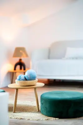 Un ou plusieurs lits dans un hébergement de l'établissement L'Air du Sud - appartement chaleureux Le Tréport
