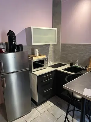 Cuisine ou kitchenette dans l'établissement Carpediem