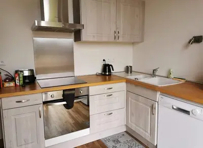 Cuisine ou kitchenette dans l'établissement Gite mes pt'tis lits maison chaleureuse 4 chambres