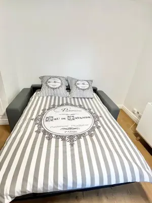 Un ou plusieurs lits dans un hébergement de l'établissement Deux pièces cosy à La Croisette