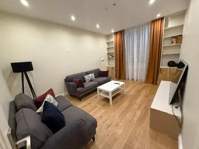 Télévision ou salle de divertissement dans l'établissement Les appartements de Chantilly - gare