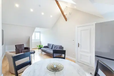 Coin salon dans l'établissement Les appartements de Chantilly - gare
