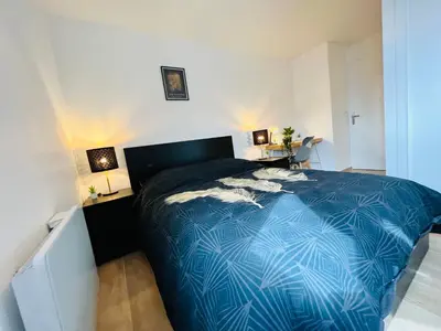 Un ou plusieurs lits dans un hébergement de l'établissement Appartement luxueux et cosy