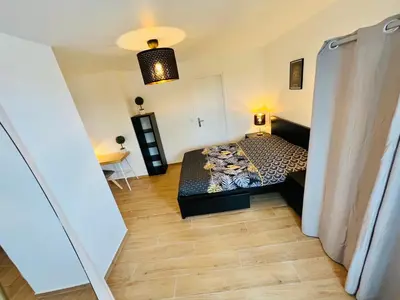 Un ou plusieurs lits dans un hébergement de l'établissement Appartement luxueux et cosy