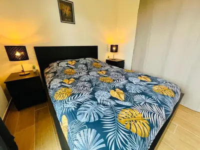 Un ou plusieurs lits dans un hébergement de l'établissement Appartement luxueux et cosy