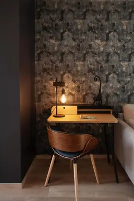 Coin salon dans l'établissement Appartement Les Jardins de Jules Verne - Côté Jardin