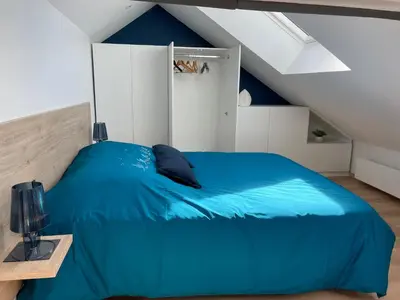 Un ou plusieurs lits dans un hébergement de l'établissement Appartement Les Jardins de Jules Verne - Côté Mer