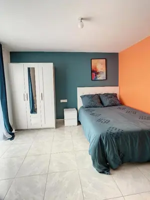 Un ou plusieurs lits dans un hébergement de l'établissement GRAND STUDIO AMIENS GARE TOUT CONFORT WIFI NETFLIX 2PERS