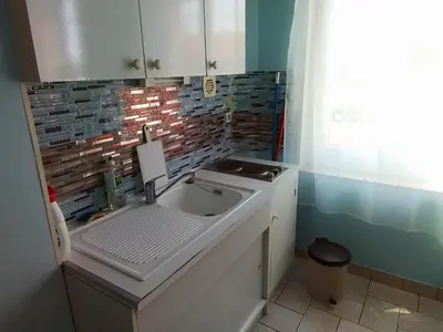 Cuisine ou kitchenette dans l'établissement Charmant studio centre bourg