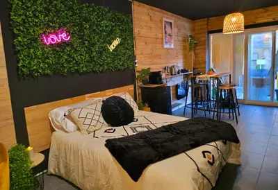 Un ou plusieurs lits dans un hébergement de l'établissement Homelove Spa