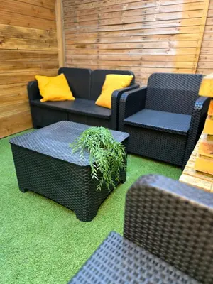 Coin salon dans l'établissement Homelove Spa