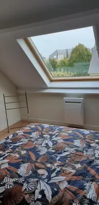 Un ou plusieurs lits dans un hébergement de l'établissement Le Paradis des Fleurs