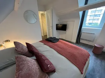 Télévision ou salle de divertissement dans l'établissement Appartement avec terrasse en plein cœur de Vernon