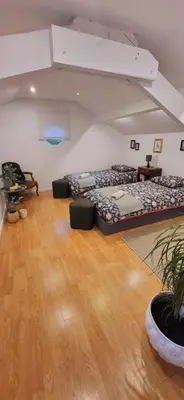 Un ou plusieurs lits dans un hébergement de l'établissement Nalan Johannisien, Maison piscine chauffée-Spa, Paris CDG-Disney