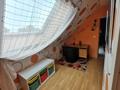 Télévision ou salle de divertissement dans l'établissement Les Arches.