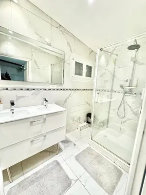 Salle de bains dans l'établissement Agréable chambre