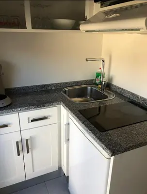 Cuisine ou kitchenette dans l'établissement Studio à 300 m de la gare de Mantes-la-Jolie