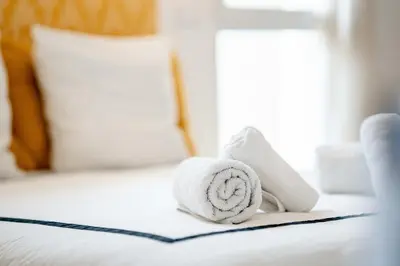 Un ou plusieurs lits dans un hébergement de l'établissement L'Air des Falaises - appartement confort Tréport