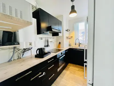 Cuisine ou kitchenette dans l'établissement Grand T2 au RDC hyper centre Navette et Sauna en option