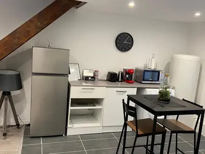 Cuisine ou kitchenette dans l'établissement Chantignolle, proche aéroport