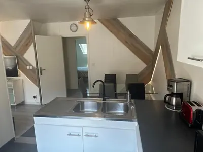 Cuisine ou kitchenette dans l'établissement Centre-ville f3 tout confort