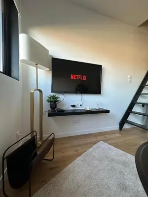 Télévision ou salle de divertissement dans l'établissement Appartement moderne - 1 chambre
