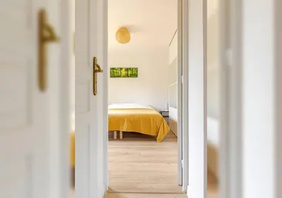 Un ou plusieurs lits dans un hébergement de l'établissement Chambre privée avec sauna pour deux