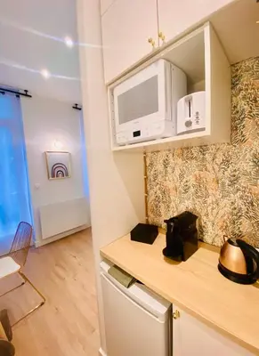 Cuisine ou kitchenette dans l'établissement Au Chant des Oiseaux - Rouen Gare