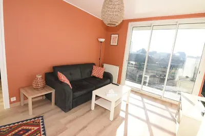 Coin salon dans l'établissement La Jetée Appartement Vue Mer