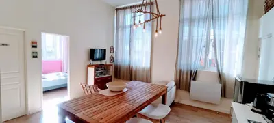 Télévision ou salle de divertissement dans l'établissement 5 Spacieux, chaleureux, hyper centre 300m de la mer